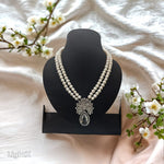 Pearl necklace with a silver pendant