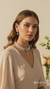 pearl necklace set with a pendant and matching earrings.